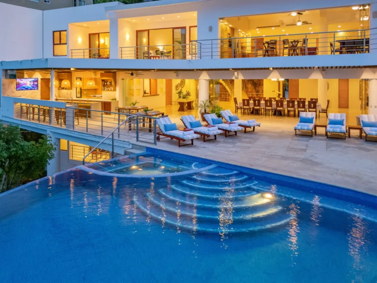 Villa Magnifico Luxury villa in Mismaloya, near Puerto Vallarta: open balconies, outdoor dining, infinity pool, sunset views.