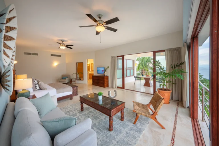 Villa Magnifico Luxury villa in Mismaloya, Mexico: Spacious room with seating area, king-size bed, balcony with ocean views.