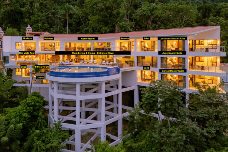 Villa Magnifico Luxury white villa in lush Mismaloya forest, near Puerto Vallarta, Mexico, with gym, game room, and suites.